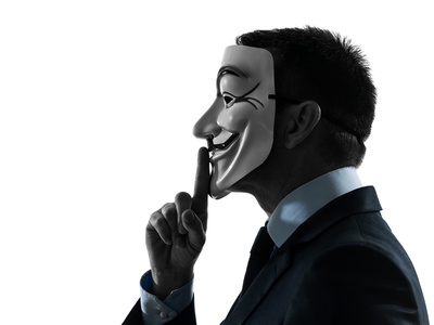 man masked anonymous group member hushing  silhouette portrait